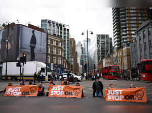 Activists from "Just Stop Oil" block a road, in London