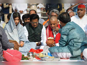 Haridwar: Samajwadi Party President Akhilesh Yadav with wife Dimple Yadav perfor...