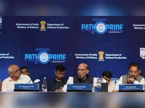 Ahmadabad :Union Defence Minister Rajnath Singh with Gujarat Chief Minister Bhupendra Patel and Minister of State for Defence Ajay Bhatt during curtain raiser for defence expo 2022 in Gandhinagar on Monday, Oct. 17, 2022.(PHOTO:IANS/Siddharaj Solanki)