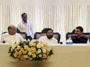 Mumbai: NCP Chief Sharad Pawar with Maharashtra CM Eknath Shinde and deputy CM D...