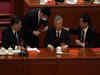 Former Chinese leader Hu Jintao, seated next to President Xi Jinping, escorted off stage during Communist Party congress