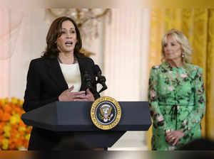First lady Jill Biden listens as Vice President Kamala Harris speaks during an e...
