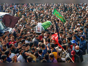 Srinagar: People carry the mortal remains of former chairman of Hurriyat Confere...