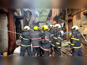 Mumbai, Oct 25 (ANI): Firefighters douse a fire that broke out at a godown, at S...