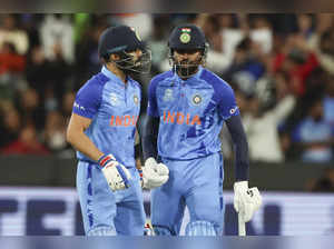 India's Virat Kohli, left, and Hardik Pandya talk during the T20 World Cup crick...