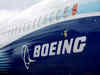 Boeing takes $2.8 bln hit in defense business, keeps cash flow goal