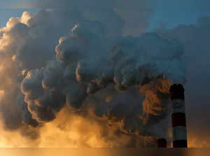 FILE PHOTO: Smoke and steam billows from Belchatow Power Station, Europe's largest coal-fired power plant operated by PGE Group, near Belchatow