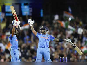 India's Virat Kohli, left, and teammate Suryakumar Yadav react at the end of the...
