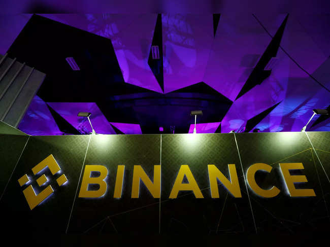 FILE PHOTO: The logo of Binance is seen on their exhibition stand at the Delta Summit, Malta's official Blockchain and Digital Innovation event promoting cryptocurrency, in St Julian's