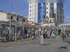 Somalia's president says at least 100 killed in car bombings