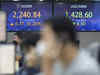 Asian stocks creep higher on hopes Fed will tone down hikes