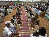 Faithfuls wait to break their fast