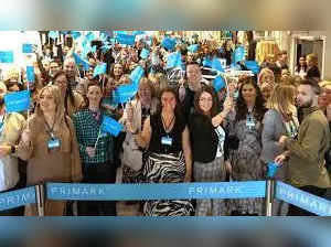 Primark employees welcome customers back to their Belfast location