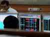 Sensex loses 215 points ahead of Fed outcome, Nifty holds 18,000