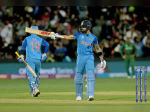 Adelaide, Nov 02 (ANI): India's Virat Kohli raises his bat after completing his ...