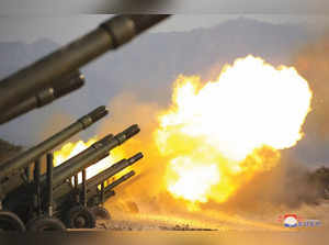 North Korea leader Kim Jong Un observes artillery fire competition in North Korea