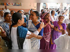 Ahmedabad: Relatives and followers of Self-Employed Women's Association (SEWA) F...