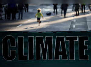 FILE PHOTO: Climate change activists gather to protest outside of BlackRock headquarters, in San Francisco