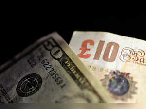 Illustration photo of British Pound Sterling and U.S. Dollar notes