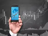 Lea with ETMarkets: How does share buyback affect your portfolio?