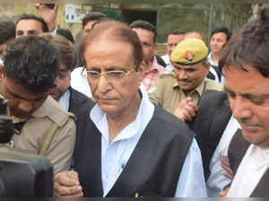 Rampur: Samajwadi Party leader Azam Khan leaves from session court, in Rampur. T...