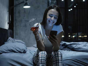 alcohol-smartphone-bed_gettyimages.