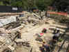Italian Archaeologists excavate statues from lost bath house in Tuscany