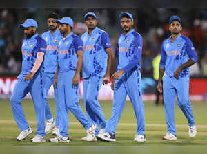 Indian players walk from the field after the T20 World Cup cricket semifinal bet...
