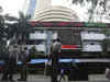 Sensex, Nifty open flat amid mixed global cues; LIC surges 8%