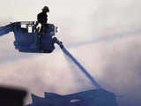 A firefighter tackles a fire