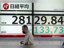 Japanese shares edge higher despite surprise economic contraction