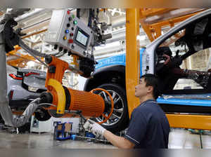 FILE PHOTO: Employee works on the production line of Nio electric vehicles in Hefei