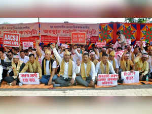 Guwahati: Members of All Koch-Rajbongshi Sanmilani and other six organisations staging a protest dharna demanding Scheduled Tribe (ST) status to the community in Guwahati on Nov 10, 2022. (Photo: Anuwar hazarika/IANS)
