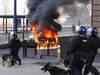 Riots spread across England, policemen flood London