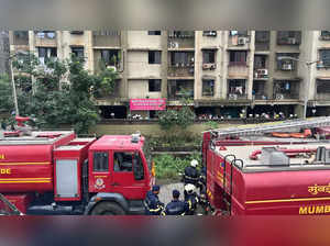 Mumbai: Fire brigade vehicles at the site after a fire broke out on the 12th flo...