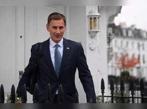 British Chancellor of the Exchequer Jeremy Hunt leaves his home, in London