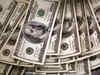 Dollar on track for weekly gain as Fed pushes back on pivot