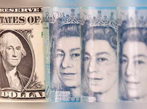 Pound and U.S. dollar banknotes are seen in this illustration