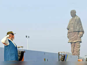 Kevadia: Prime Minister Narendra Modi salutes during the National Unity Day programme on the 147th birth anniversary of Sardar Vallabhai Patel at the Statue of Unity, in Kevadia, Gujarat on Monday, Oct. 31, 2022. (Photo: PIB/IANS)