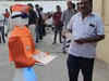 Watch robot distributes pamphlets, raises slogans for BJP in Gujarat