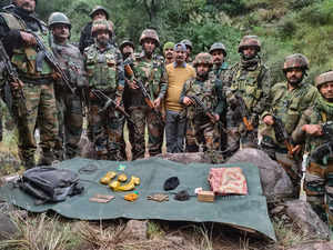 Ramban: Security personnel show improvised explosive devices (IED) and ammunitio...