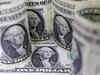 Dollar edges higher as China COVID worries spur defensive buying