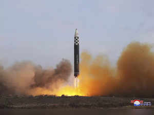 North Korea's Kim boasts new ICBM as US flies bombers