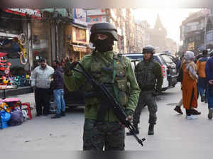 Srinagar, Nov 21 (ANI):  Central Reserve Police Force (CRPF) personnel stand gua...