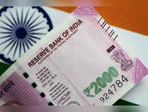 Rupee gains 26 paise to 81.67 against US dollar