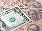 Rupee firms as signs of Fed slowdown boosts risk appetite