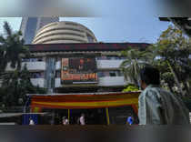 Sensex trades marginally lower, Nifty below 18,500