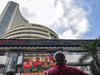 Sensex, Nifty end flat after choppy session