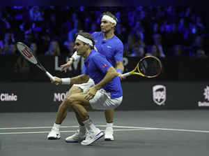 Team Europe's Roger Federer, front, and Rafael Nadal in action during their Lave...