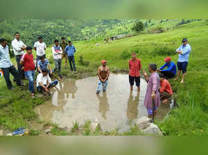 **EDS: TO GO WITH STORY** Dehradun: Dwarika Prasad Semwal promoting rainwater co...